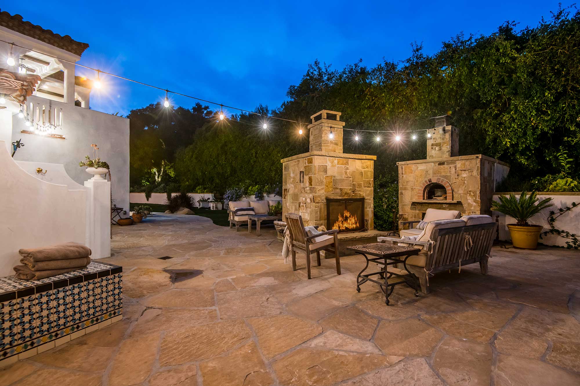 Decorative stamped concrete patio with a natural stone pattern.